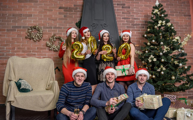 Fototapeta premium Happy group of friends celebrating new year night