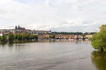 Spring view of Vltava river, boats and city view of Prague / Prague, Czech Republic, May 2019