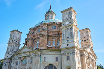 Fototapeta na wymiar Vicoforte church in a sunny summer day in Piedmont, blue sky in Italy