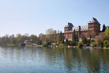 Fototapeta na wymiar Valentino castle and Po river in a sunny spring day in Piedmont, Turin, Italy
