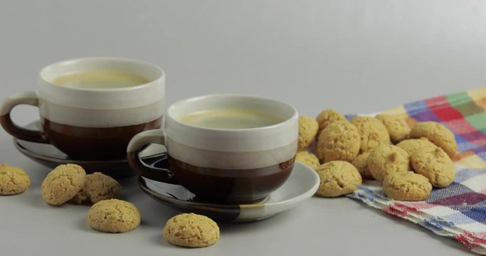 Cookie and two cups of coffee. Kruidnoten, pepernoten, strooigoed