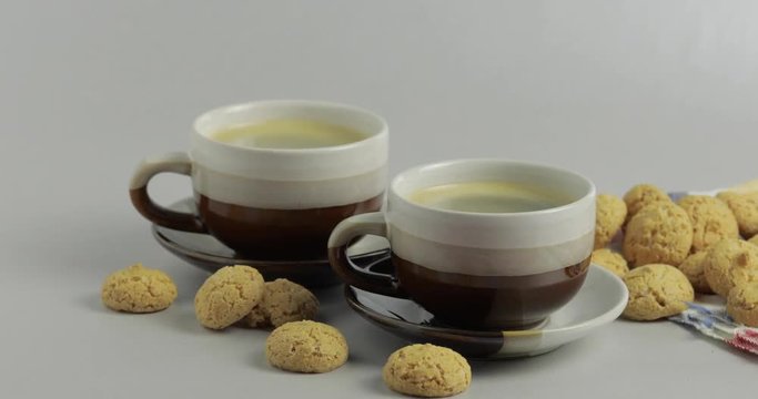 Cookie and two cups of coffee. Kruidnoten, pepernoten, strooigoed