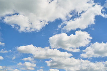 Beautiful blue sky with white clouds, copy space. Blue and white pastel heaven background