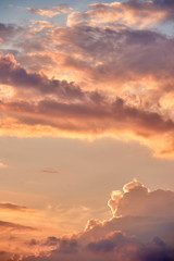 Beautiful sunset in evening time, copy space. Bright pink and yellow colors sky background. Evening twilight sky