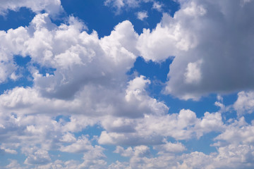 Naklejka na ściany i meble Clouds on a blue sky on a summer day