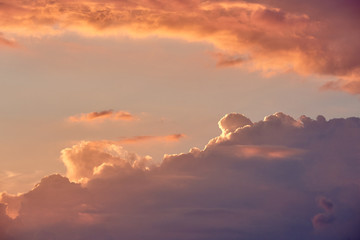 Beautiful sunset in evening time, copy space. Bright pink and yellow colors sky background. Evening twilight sky