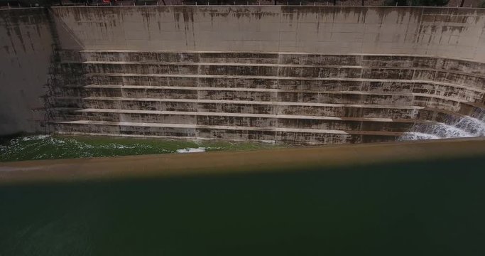 Cinematic Pov Aerial of Concrete Water Cascade Channel System and Waterfalls on Controlled Lake Artificial Dam 4k