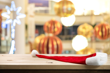 Wood table top with blur of lighting in Christmas festival. selective focus.celebration concept