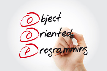 Hand writing OOP Object Oriented Programming with marker, acronym business concept