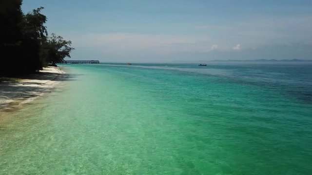 drone shot of beautiful clear tropical beach