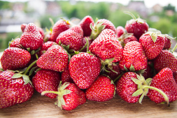 group of strawberries on rustic background