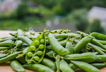 green peas on rustic background