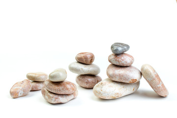 Fototapeta na wymiar Small colorful sea stones, isolated on white. Top view with copy space.
