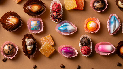 Modern chocolate bonbons set on paper background