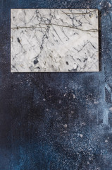 Marble Board on Blue Background