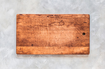 Old Chopping Board on Grey Background
