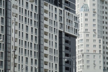 Fototapeta premium Ekaterinburg, Sverdlovsk Region, Russia, May 2019. City landscape. Photo of fragments of new buildings on the street Tatishchev. The section of Tatischev street from Krylov street to Tokarey street.
