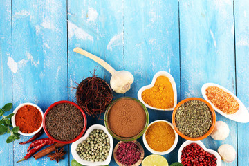 Spices and herbs variation on table. Food and cuisine ingredients.