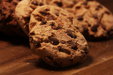 Chocolate cookies on wooden table. Chocolate chip cookies