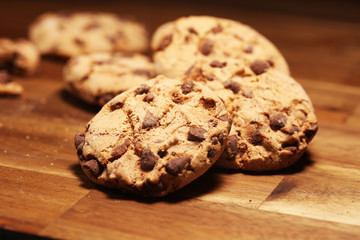 Chocolate cookies on wooden table. Chocolate chip cookies
