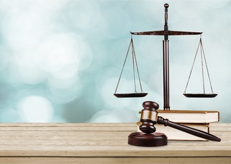 Justice Scales and books and wooden gavel