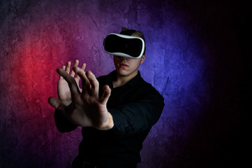 Portrait of young man with 3D virtual reality glasses 