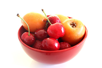 Mixed summer fruits in the bowl