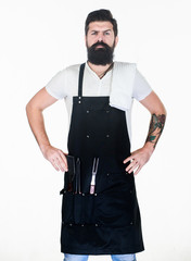 Bearded hipster wear apron for barbecue. Roasting and grilling food. Tips cooking meat. Tools for...