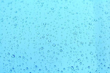 Rain drops on window. Natural water drops on glass. Selective focus