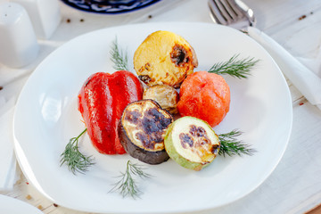Grilled vegetables - tomatoes, potato, bell pepper, eggplant anc zuccini.