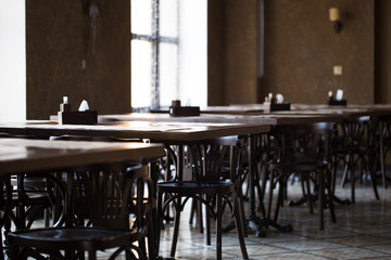 Vintage room cafe or restaurant. Tables opposite the window.