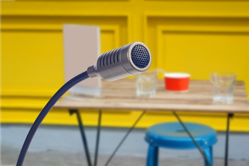 Close up of condenser microphone in conference room