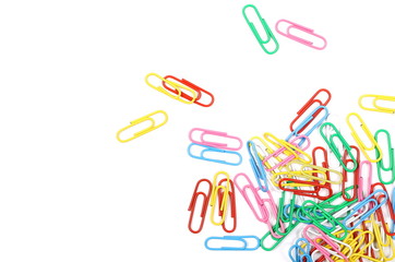 Colorful paperclips isolated on white background, top view