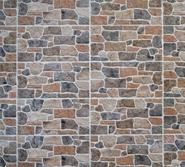 Naklejka na ściany i meble Stone wall cladding made of stoneware with rocks effect. It is used above all for exteriors, but also for rustic interiors.