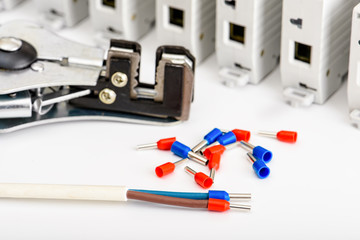Automatic circuit breakers, on a white background. Electrical equipment. Accessories for electrical protection and control