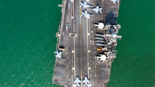 Aerial view America battleship navy nuclear aircraft carrier, USA military navy ship airplane carrier full loading plane fighter jet aircraft, United States of America, USA, 4K.