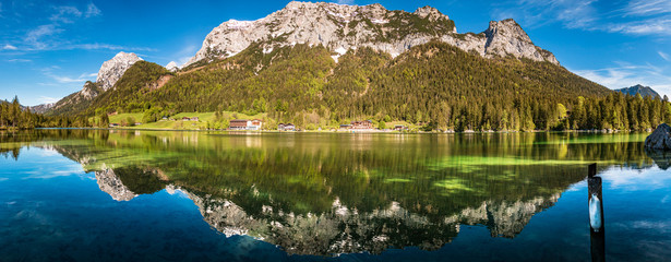 High resolution stitched panorama with reflections at the famous Hintersee near Ramsau - Bavaria - Germany