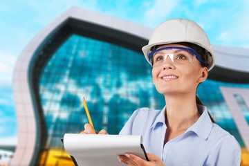 Portrait of young student of architecture  on background