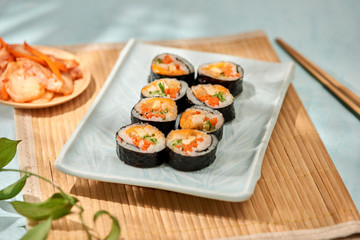 Fototapeta na wymiar Korean roll Gimbap(kimbob) made from steamed white rice (bap) and various other ingredients