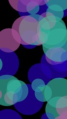 Multicolored translucent circles on a dark background. 3D illustration