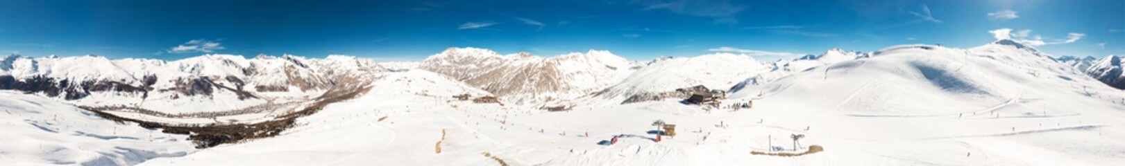 LIVIGNO, ITALY - Feb. 2019 - Skiers skiing in Carosello 3000 ski resort, Livigno, Italy, Europe