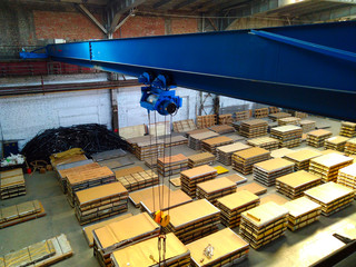 blue crane beam on metal stock