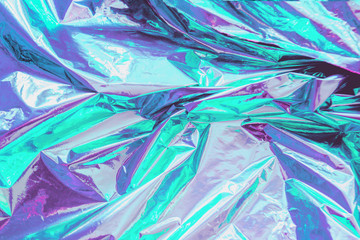 Abstract trendy holographic background. Real texture in pale violet and mint colors with scratches...