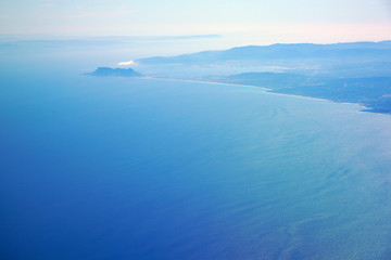 Naklejka na ściany i meble Aerial view of the Strait of Gibraltar on the South coast of Spain where the Mediterranean Sea meets the Atlantic Ocean