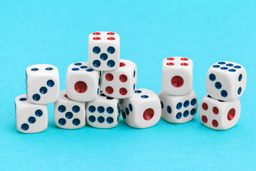 Gaming dices on blue background. Game concept.