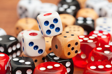 Dice on a wooden table. Concept for business risk.