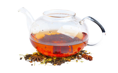 Black tea in a cup of glass. Mint and tea leaves. On white, isolated background
