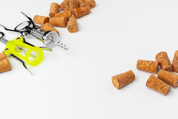 corkscrew and wine cork isolated on white background
