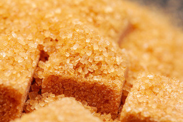 Rock sugar on dark background close up