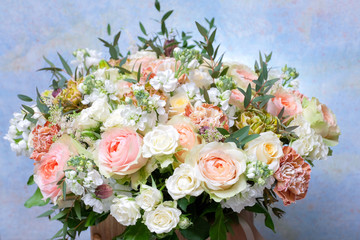 Bouquet of flowers on a blue background.